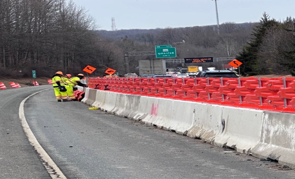 A Continues Glare Screen protects highway workers in construction zone.